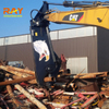 Hydraulic crusher excavator machinery working on demolition old house